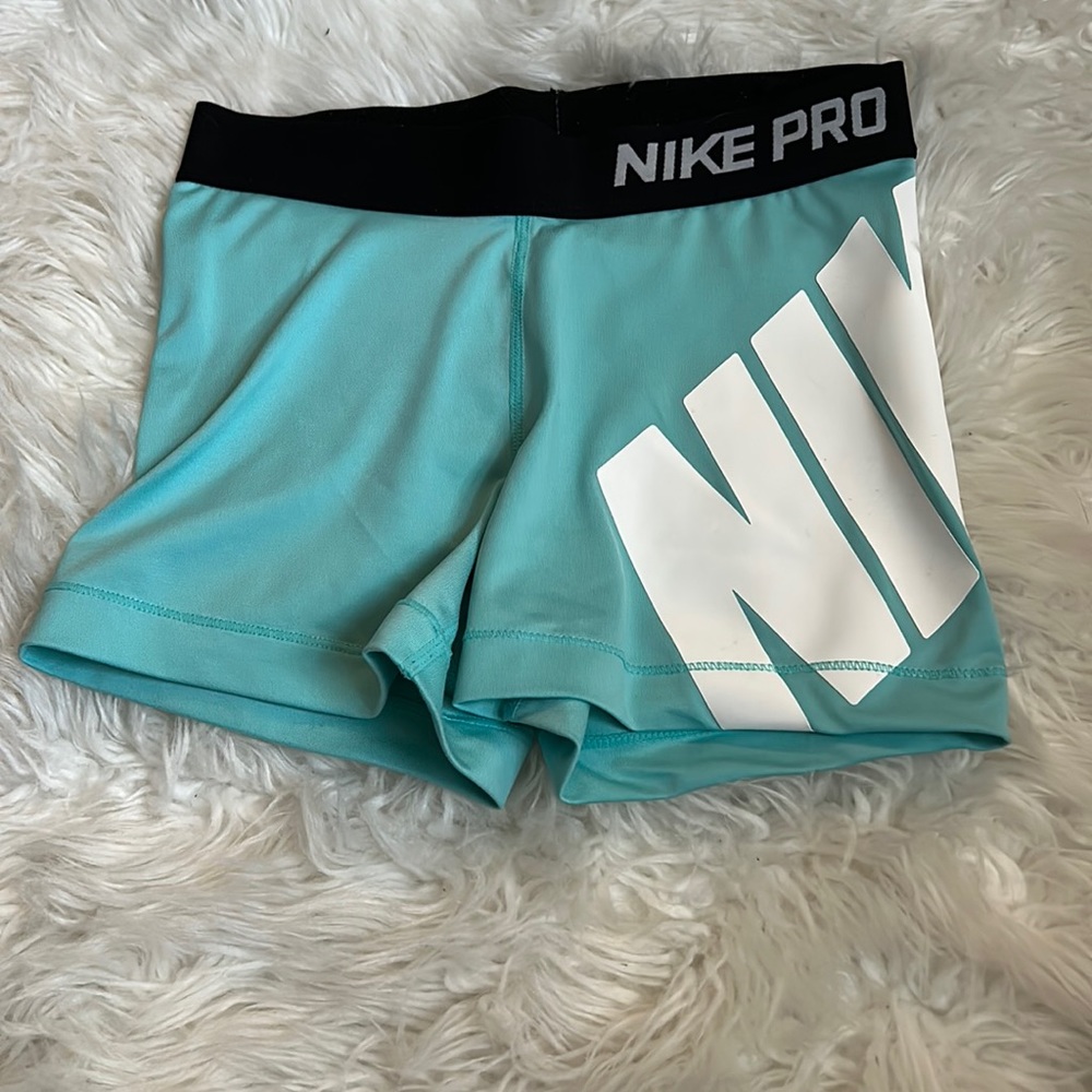 Blue Nike pro shorts